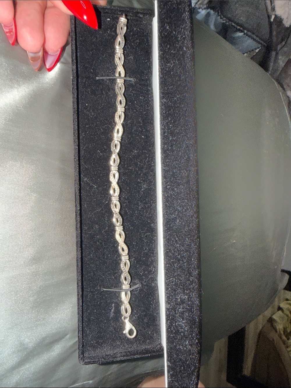 Kay Jewelers Silver Twisted Infinity Link Bracelet - Picture 2 of 3